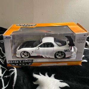 Die cast Mazda rx7s. Not hot wheels.
